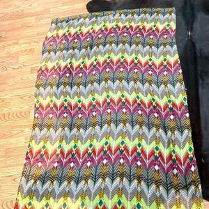Vibrant colored scarf/wrap. May also be used as a tablecloth.